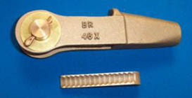 Contact wire end clamp and wedge Contact wire end clamp and wedge